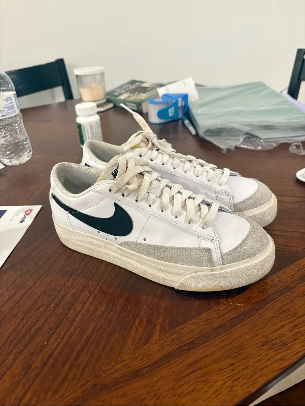Nike White Sneakers with Black Swoosh and Suede Accents